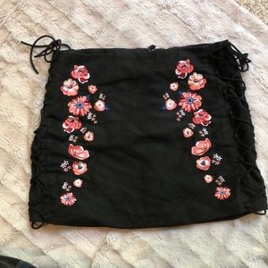 suede floral mini skirt w/ lace up side detail
